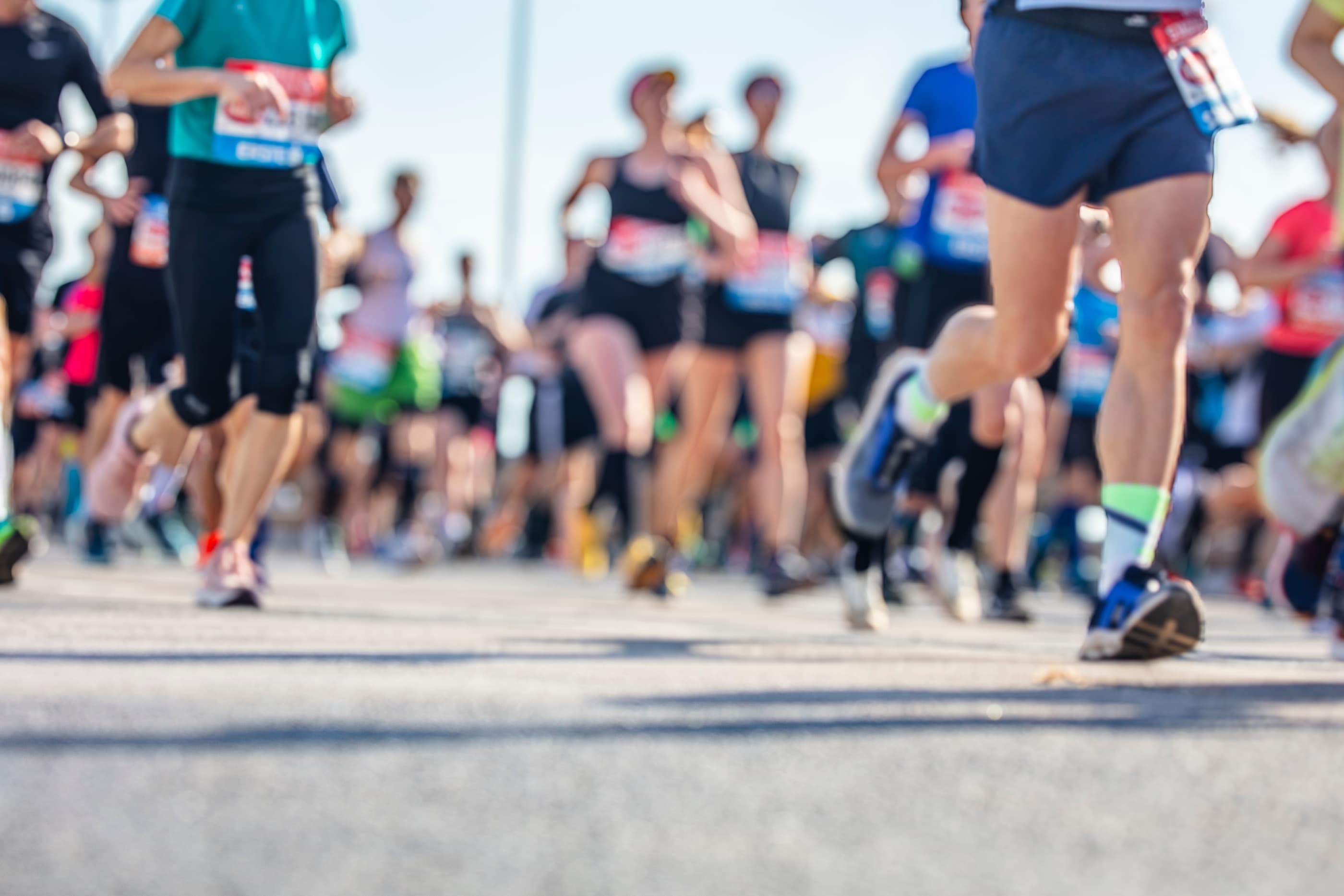 Participants running together in a city marathon