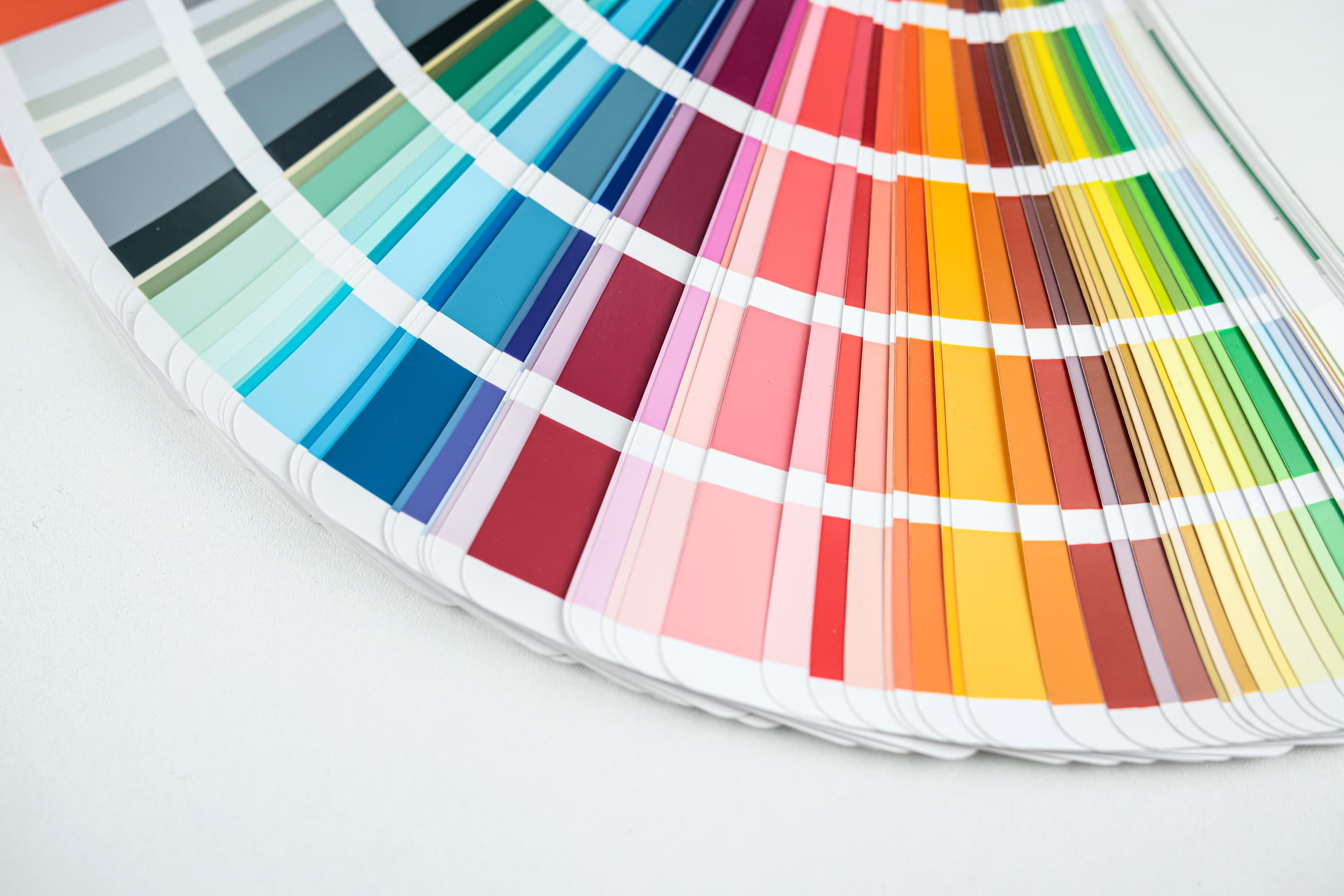 Color swatch fan deck spread across the full spectrum